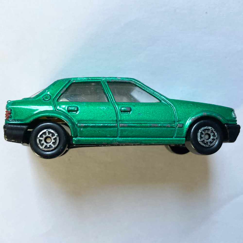 MC Toy | Peugeot 309 grünmetallic - ohne Verpackung