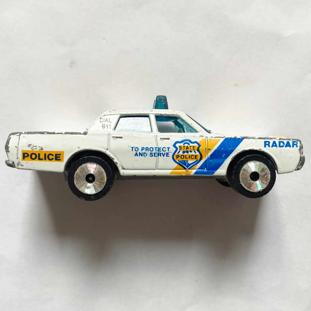 Matchbox | Laser Wheels Mercury STATE POLICE weiß/gelb/blau - ohne Verpackung